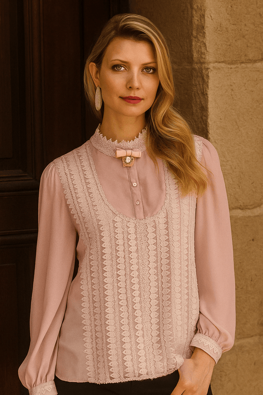 Pink ruffled puff sleeve blouse with lace trim, front pose.