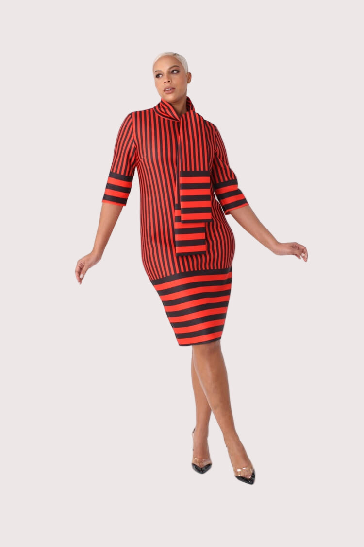 Front walking view of a red and black striped scuba bodycon dress featuring 3/4 sleeves and an attached scarf detail, highlighting movement and stretch of the fabric by For Her NYC