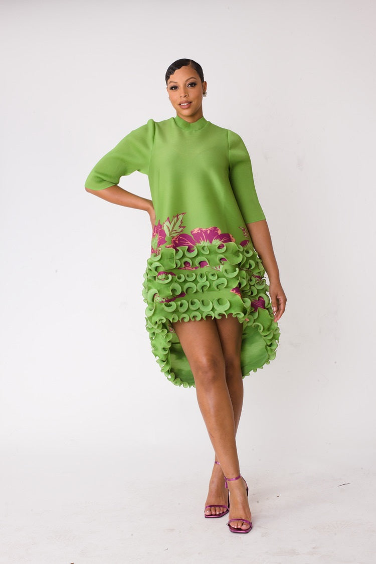 Model wearing Sculptural Ruffle High-Low Dress in walking forward pose highlighting movement of cascading ruffles and asymmetrical hem, For Her NYC