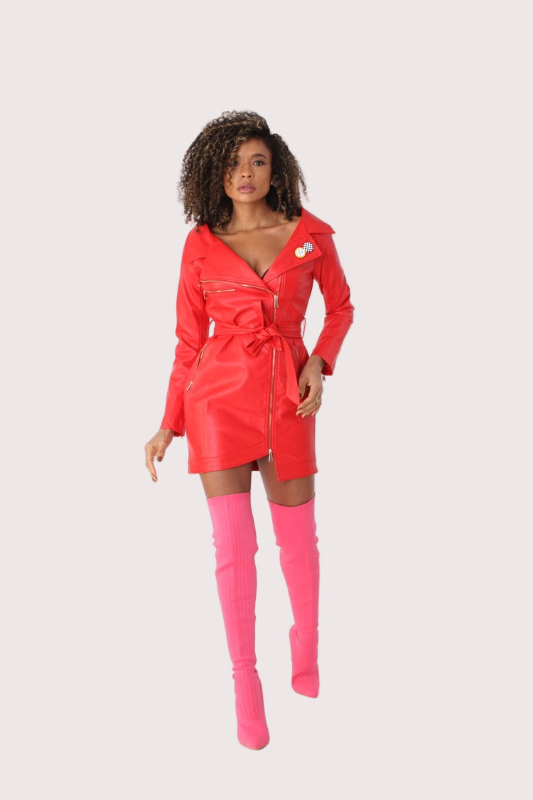 Model posing confidently in red leather zip-up dress with cinched waist and mini length, modern edgy look, For Her NYC