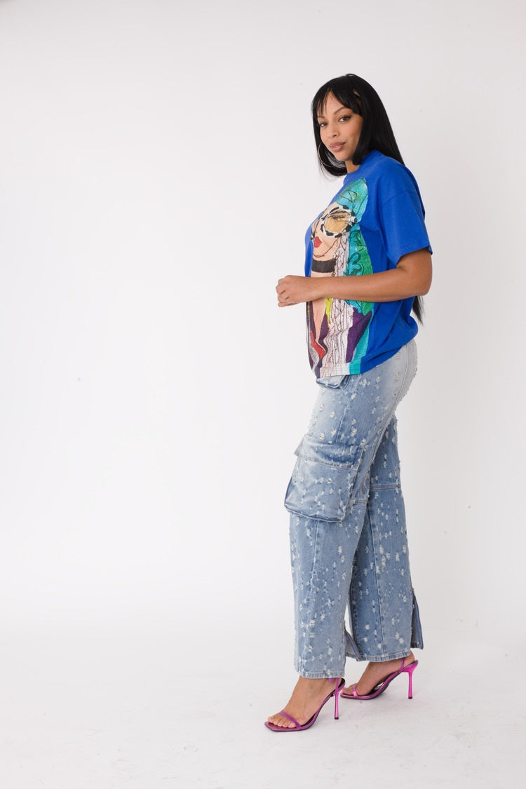 Royal multi street style graphic tee shown in side view highlighting oversized fit and drape, For Her NYC