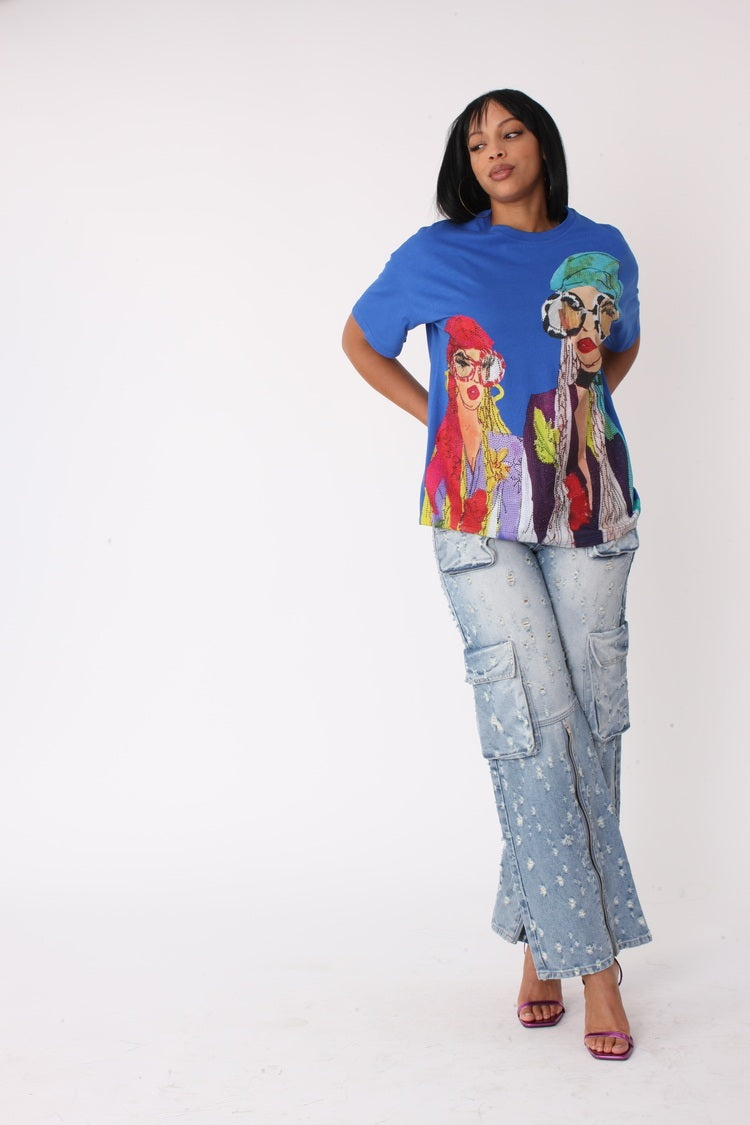 Royal multi street style graphic tee shown in side view highlighting oversized fit and drape, For Her NYC