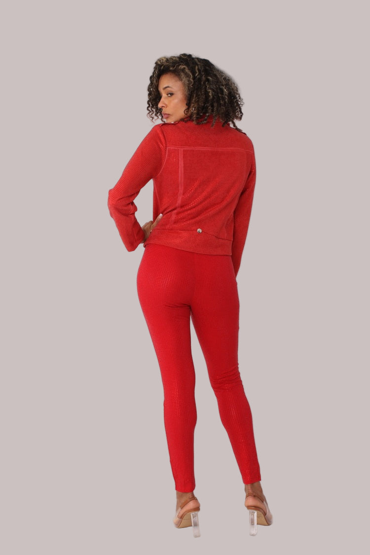 Rear angled view of red suede diamond embellished pants with hand on hip – For Her NYC