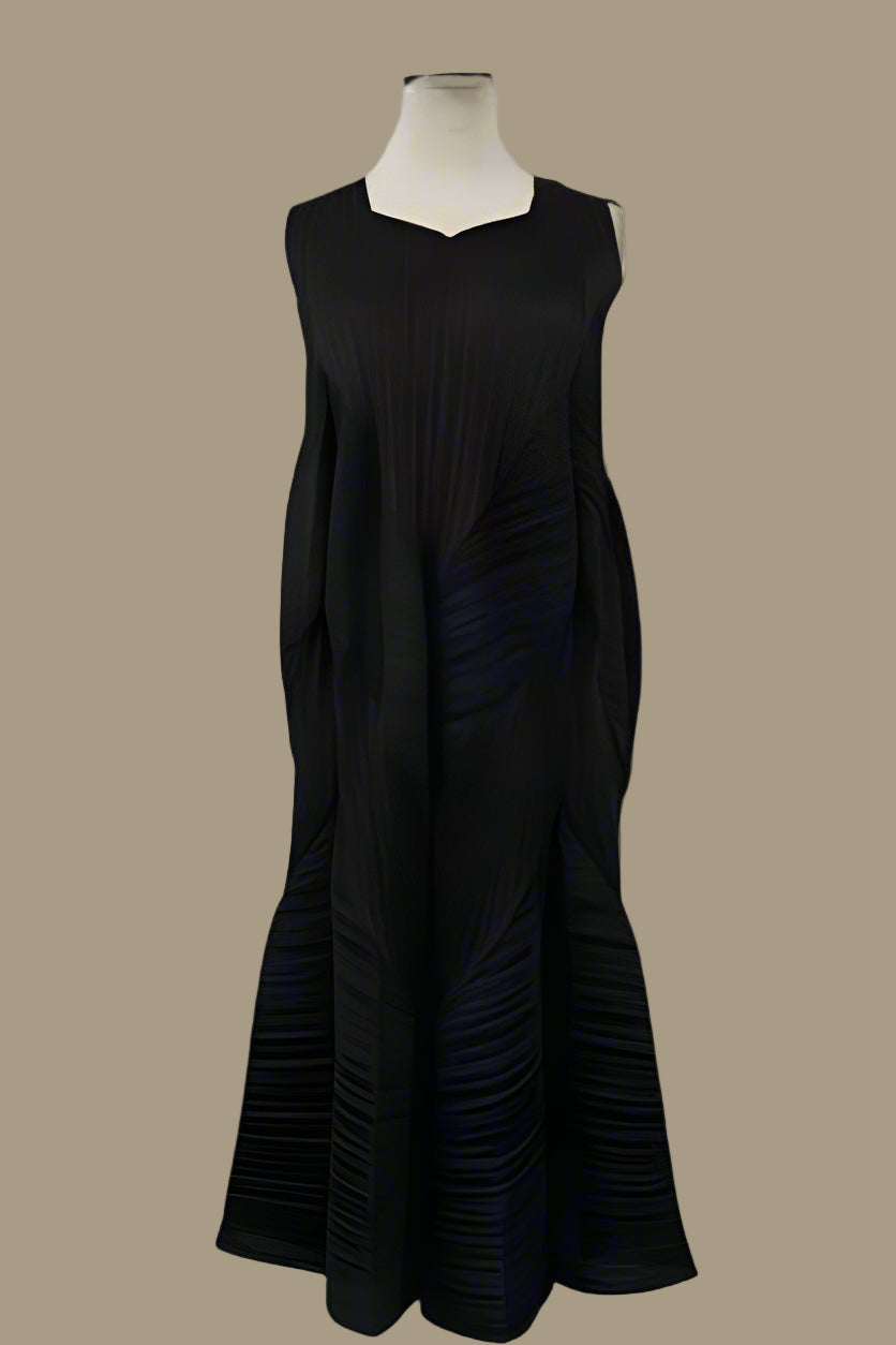 Front flat view of the black textured wave sleeveless dress highlighting sculptural pleated texture and streamlined bodice by For Her NYC