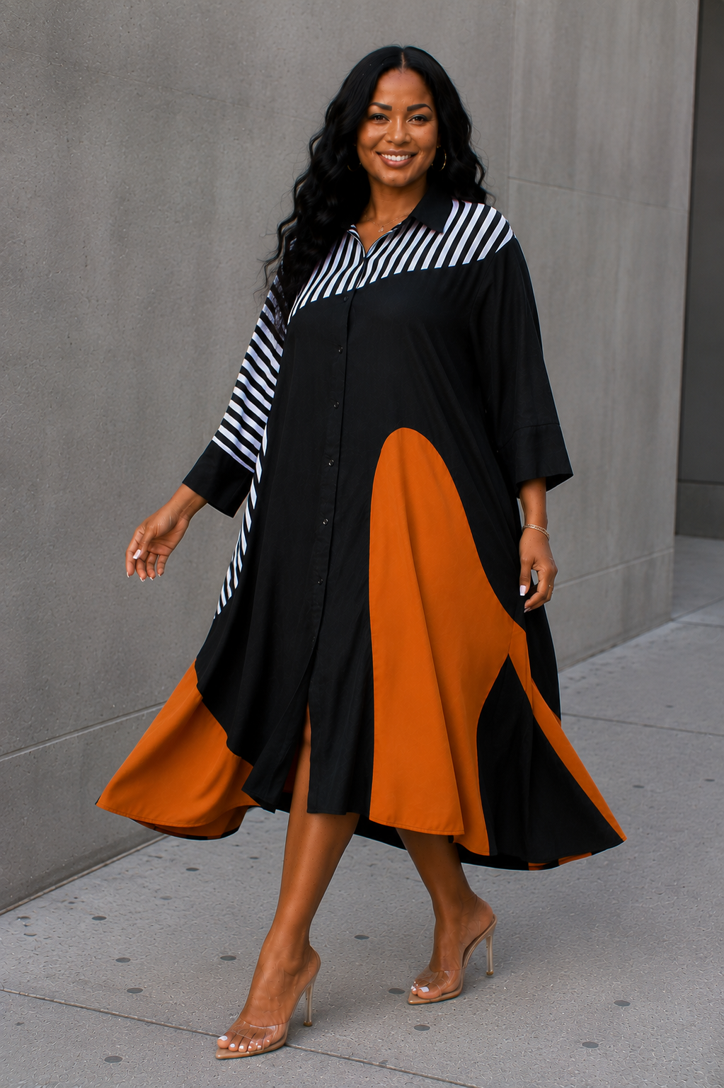 For Her NYC Bold Colorblock Shirt Dress in Black and Camel featuring mixed stripe and colorblock panels, a button-front silhouette, classic collar, three-quarter sleeves, and a relaxed midi-length fit.