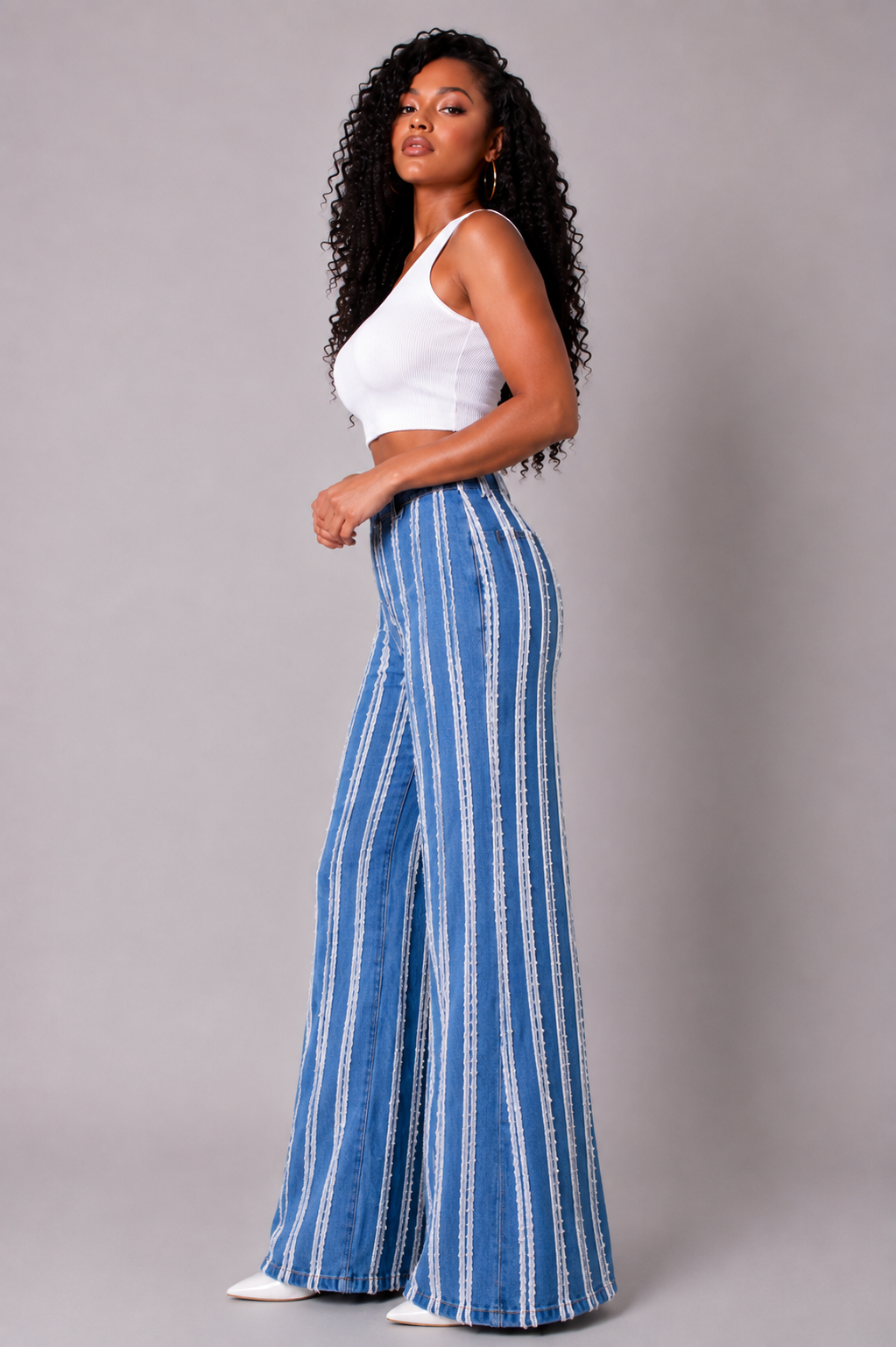 Denim vertical distressed stripe wide-leg jeans with frayed detailing and elongated silhouette front view – For Her NYC